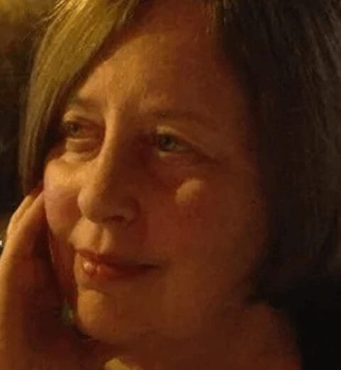 Close-up of woman smiling warmly